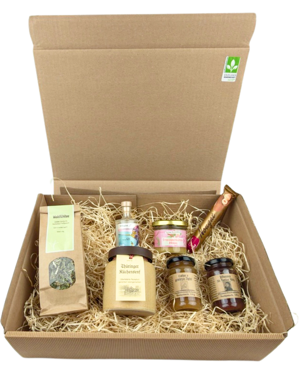 Geschenkpaket mit Wohlfühltee, Thüringer Küchensenf, Viba Nougatstange, Glockengin, Luthers gewürzte Äpfel, Pflaumen Junker Jörg, Streuobstblütenhonig