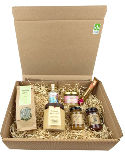 Geschenkpaket mit Wohlfühltee, Thüringer Küchensenf, Viba Nougatstange, Glockengin, Luthers gewürzte Äpfel, Pflaumen Junker Jörg, Streuobstblütenhonig