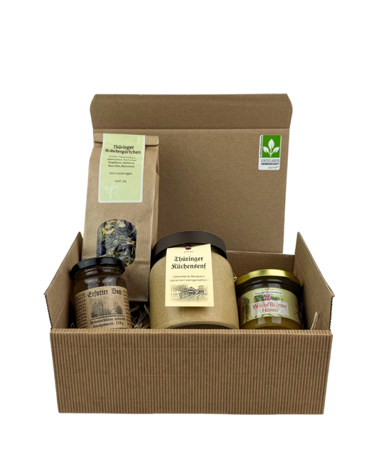 Kleine Thüringer Genussreise Geschenkpaket mit Fruchtaufstrich, Honig, Kräutertee und Küchensenf regionaler Manufakturen im Präsentkarton mit Holzwolle