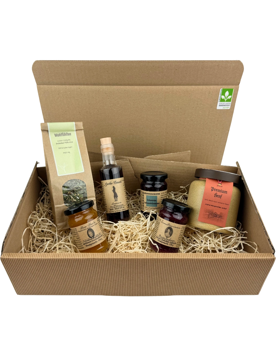 Weimarer Genussreise Geschenkpaket mit Thüringer Spezialitäten wie Fruchtaufstrichen, Premiumsenf, Kräutertee und Goethe Punsch im Präsentkarton mit Holzwolle