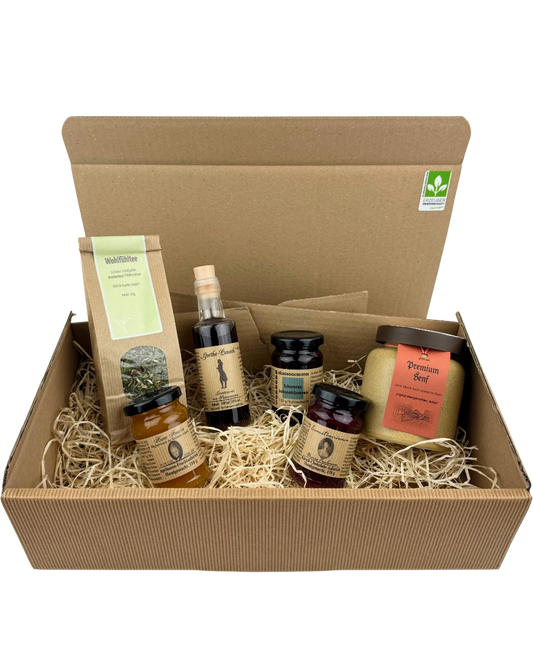 Weimarer Genussreise Geschenkpaket mit Thüringer Spezialitäten wie Fruchtaufstrichen, Premiumsenf, Kräutertee und Goethe Punsch im Präsentkarton mit Holzwolle
